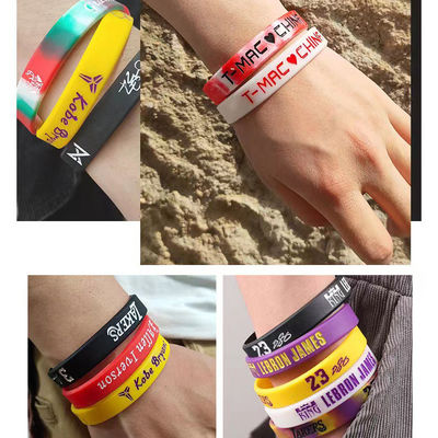 Mehrfarbige Nachtglut Leuchtstoff-Silikon-Armbänder für Basketball-Fußball-Spiele Star Ball
